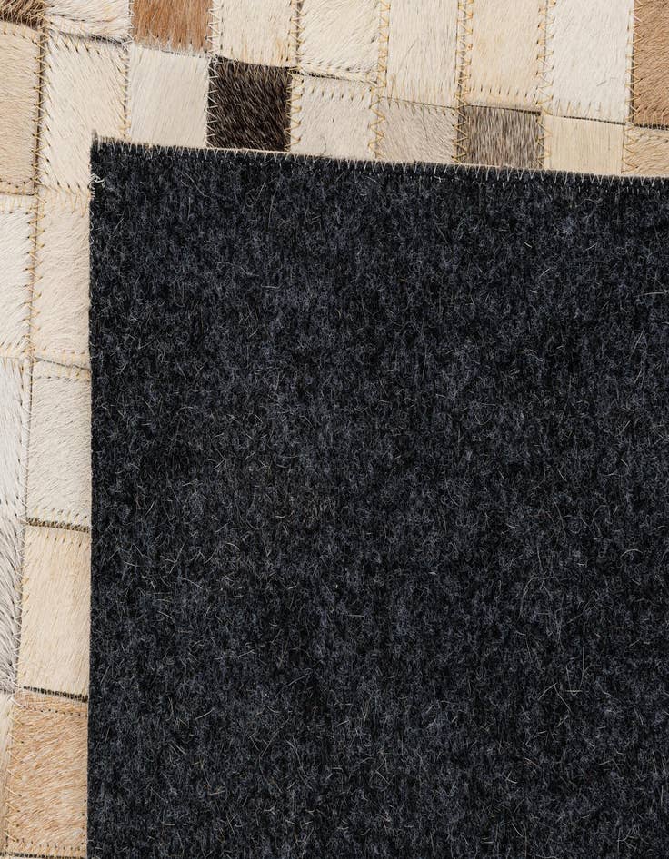 Detail image of 5' 2 x 7' 11 Cowhide - Patchwork Rug