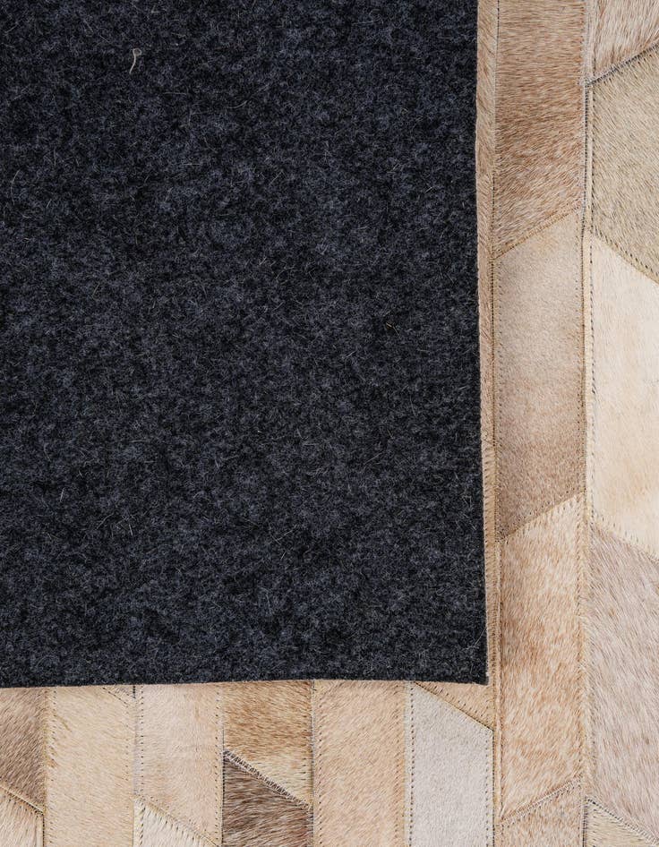 Detail image of 5' x 7' 11 Cowhide - Patchwork Rug