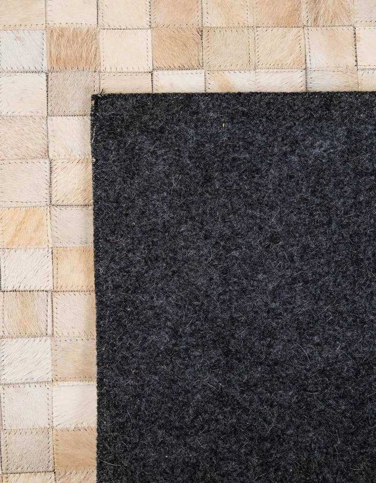 Detail image of 5' 1 x 8' Cowhide - Patchwork Rug