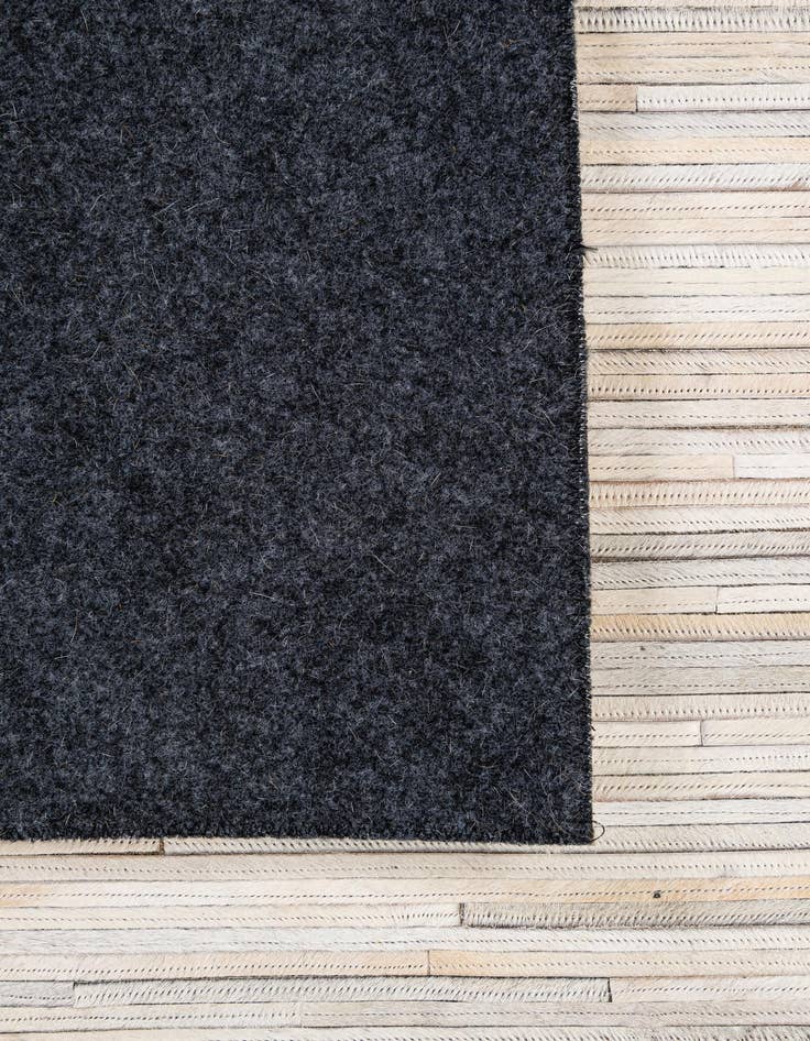 Detail image of 5' 1 x 8' Cowhide - Patchwork Rug