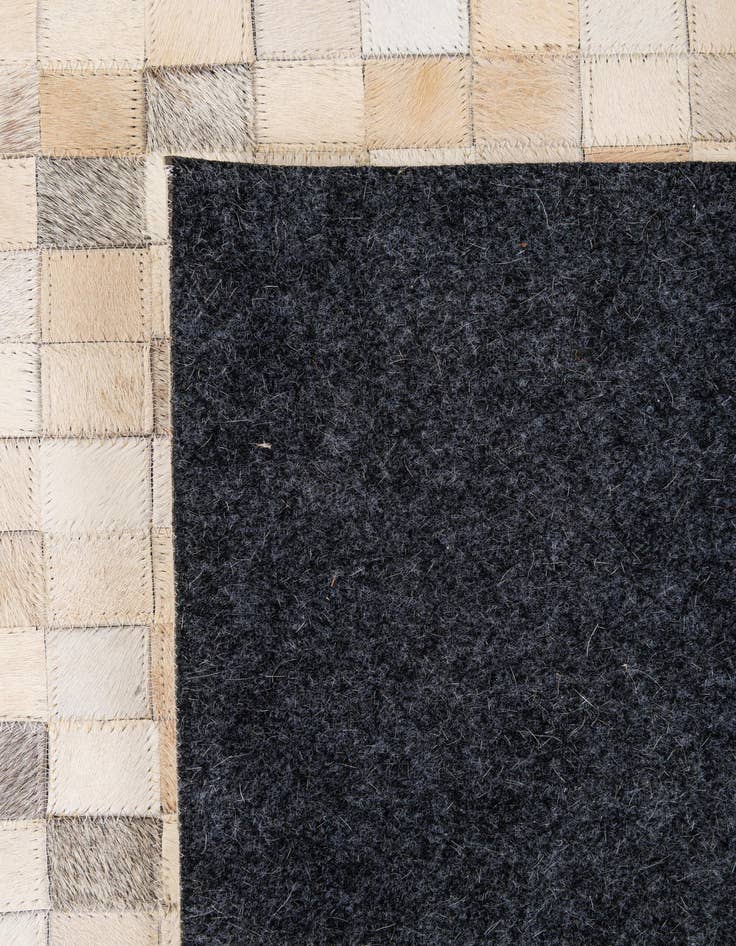 Detail image of 5' 1 x 7' 11 Cowhide - Patchwork Rug