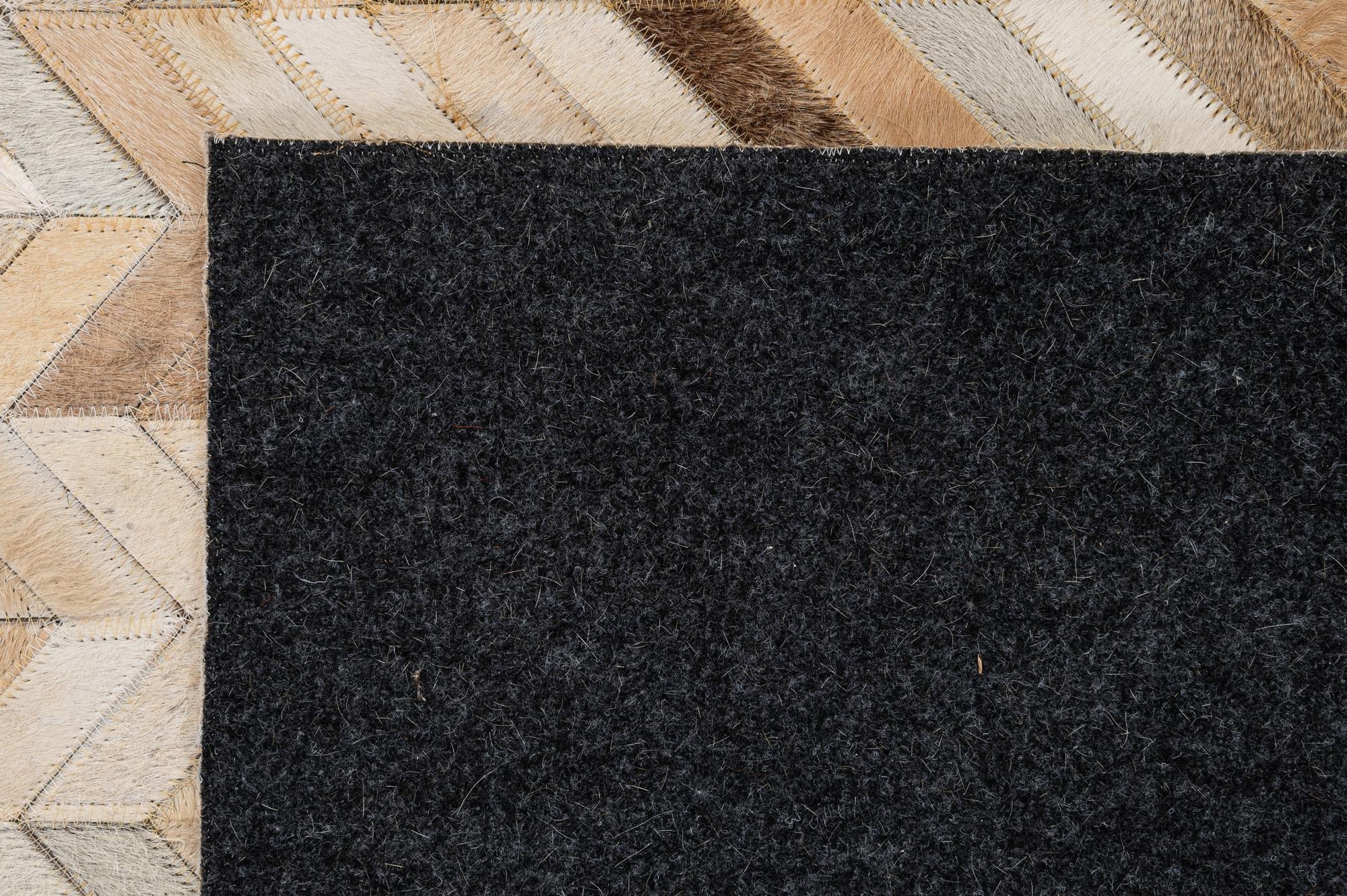 5' x 8' 2 Cowhide - Patchwork Rug