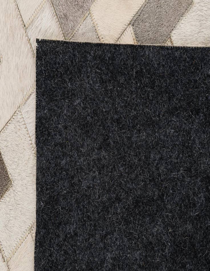 Detail image of 5' 2 x 8' Cowhide - Patchwork Rug