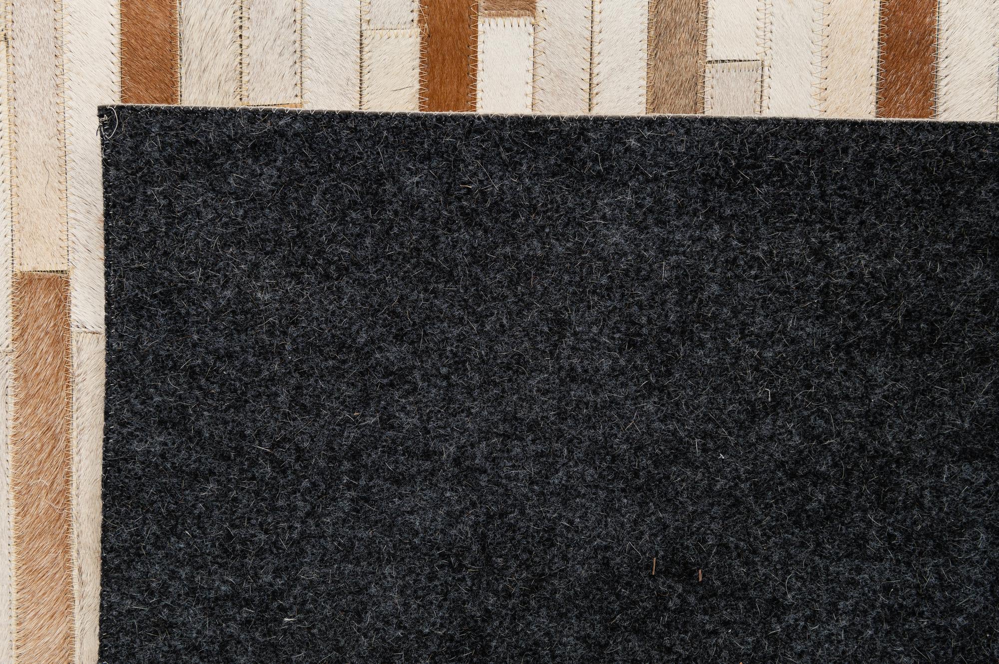 5' 1 x 7' 11 Cowhide - Patchwork Rug
