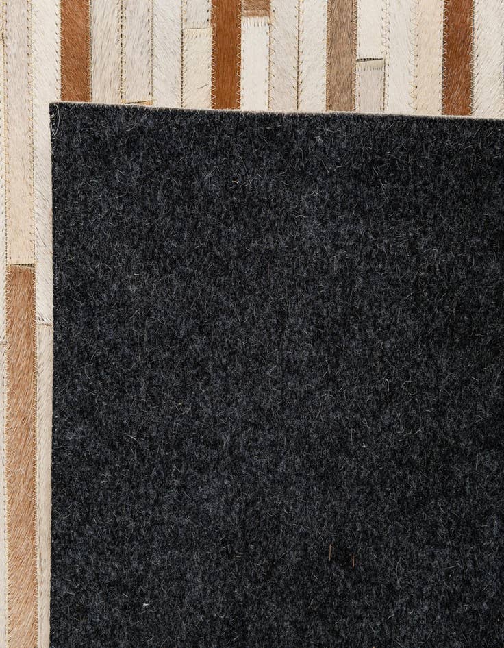 Detail image of 5' 1 x 7' 11 Cowhide - Patchwork Rug