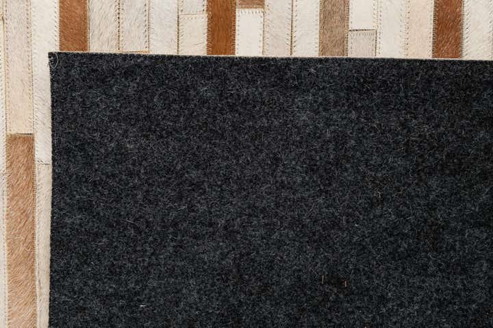 5' 1 x 7' 11 Cowhide - Patchwork Rug