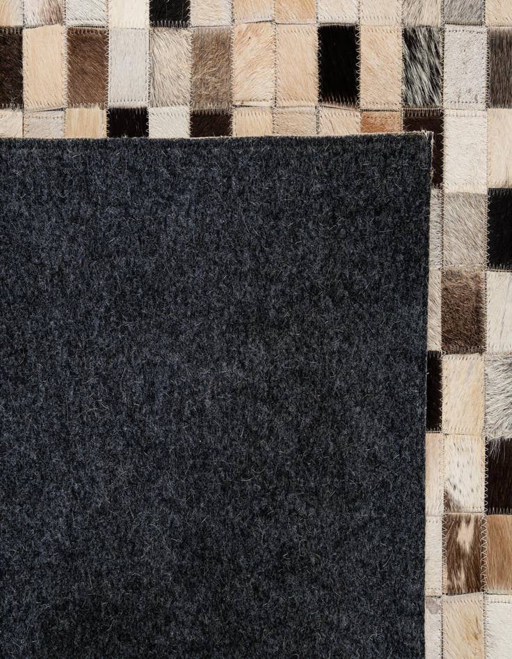 Detail image of 5' 1 x 8' 1 Cowhide - Patchwork Rug