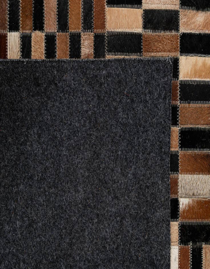 Detail image of 5' 1 x 7' 10 Cowhide - Patchwork Rug