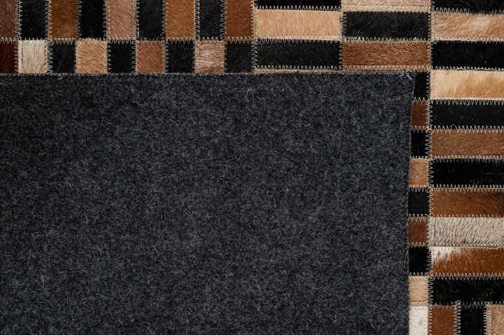5' 1 x 7' 10 Cowhide - Patchwork Rug