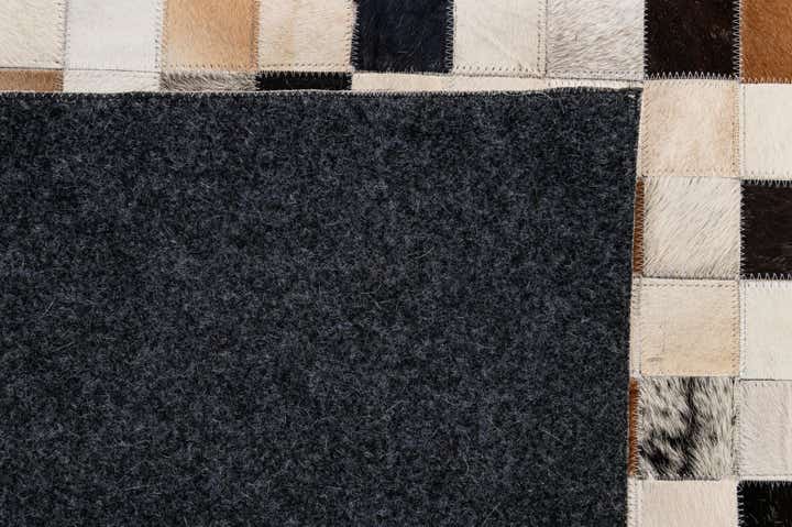 5' 1 x 7' 11 Cowhide - Patchwork Rug