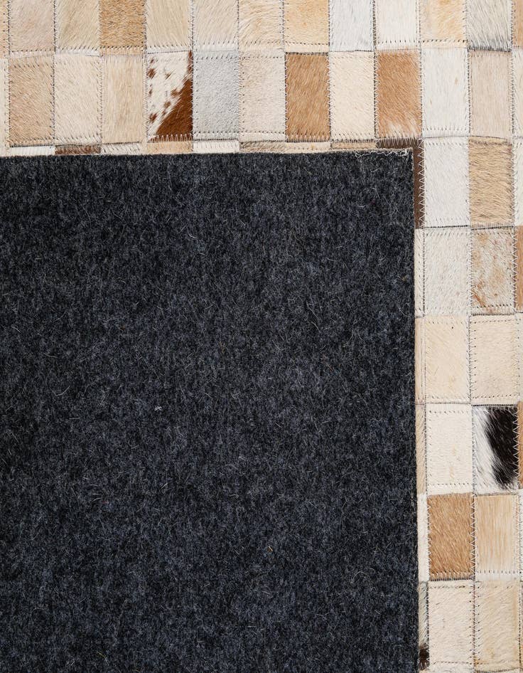 Detail image of 5' 1 x 7' 10 Cowhide - Patchwork Rug