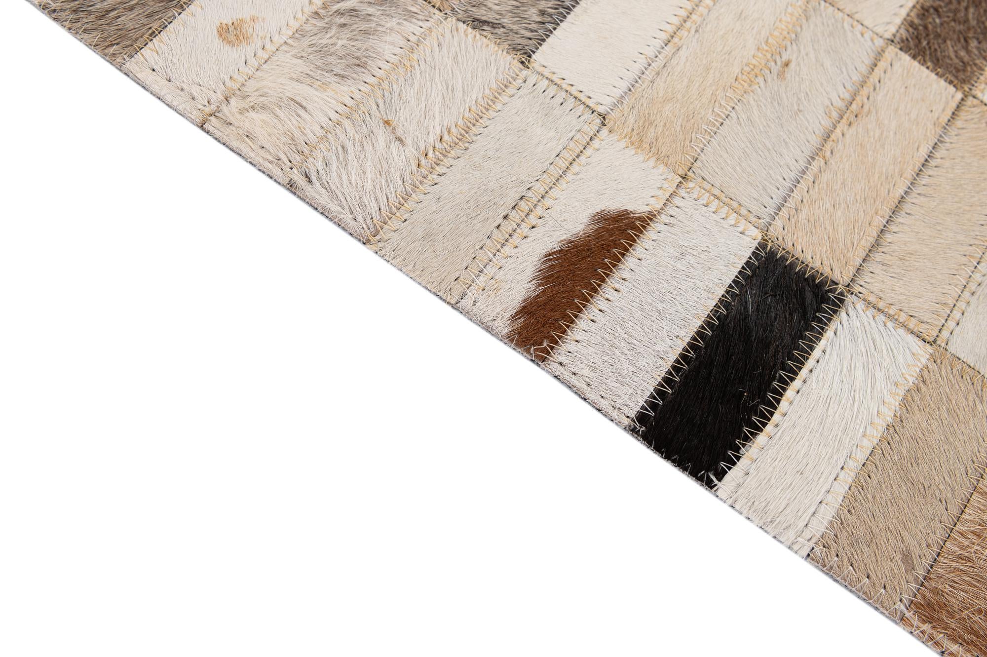 5' 2 x 7' 11 Cowhide - Patchwork Rug