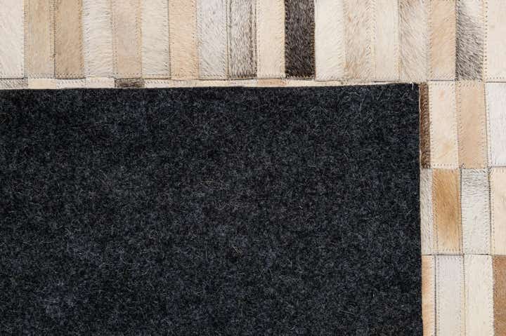 5' 2 x 7' 11 Cowhide - Patchwork Rug