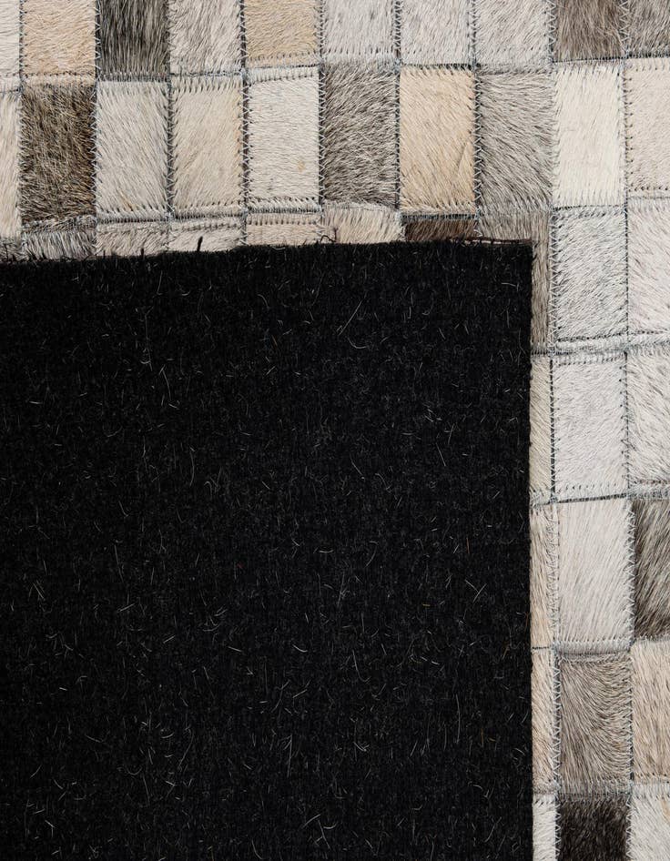Detail image of 5' 1 x 7' 10 Cowhide - Patchwork Rug