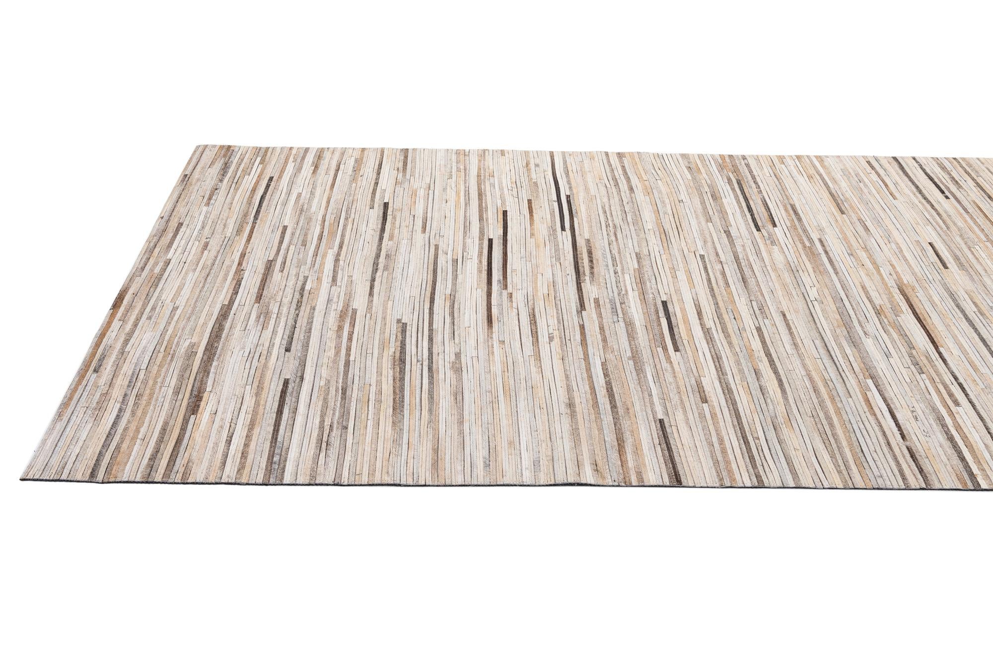 4' 11 x 8' 1 Cowhide - Patchwork Rug