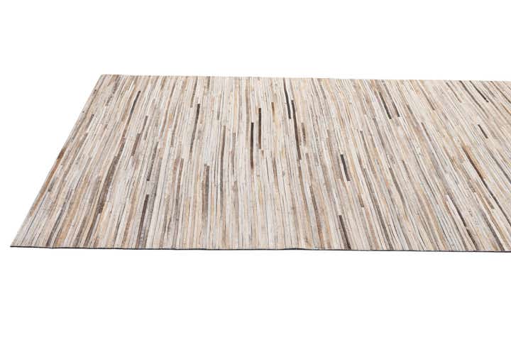 4' 11 x 8' 1 Cowhide - Patchwork Rug