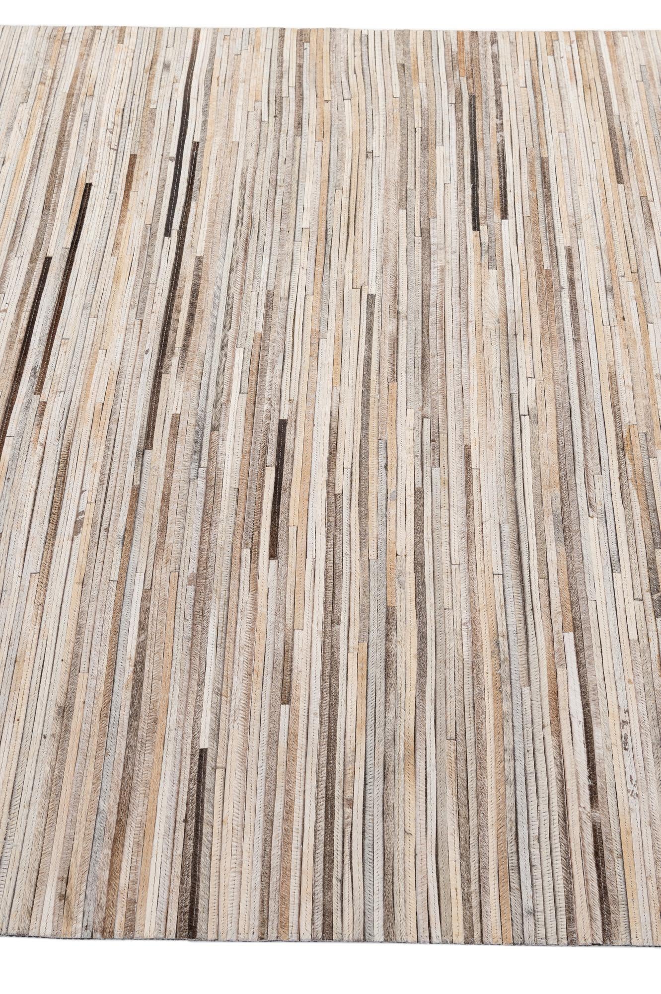 4' 11 x 8' 1 Cowhide - Patchwork Rug