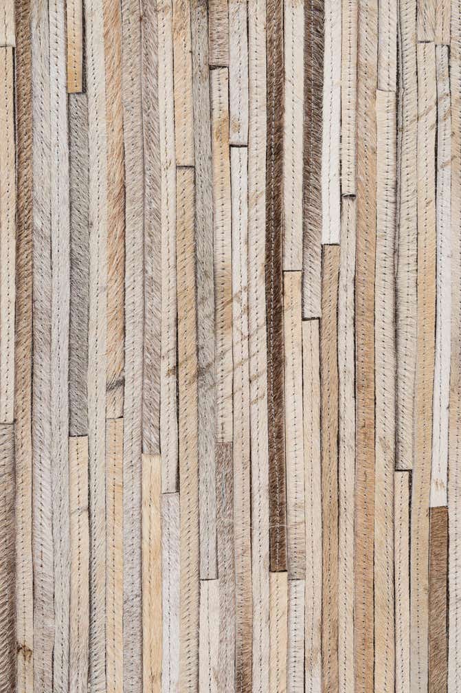 4' 11 x 8' 1 Cowhide - Patchwork Rug