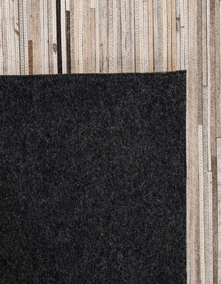 Detail image of 4' 11 x 8' 1 Cowhide - Patchwork Rug