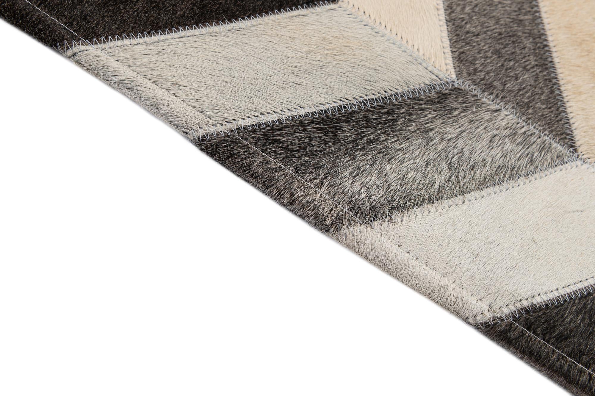 4' 1 x 6' 1 Cowhide - Patchwork Rug