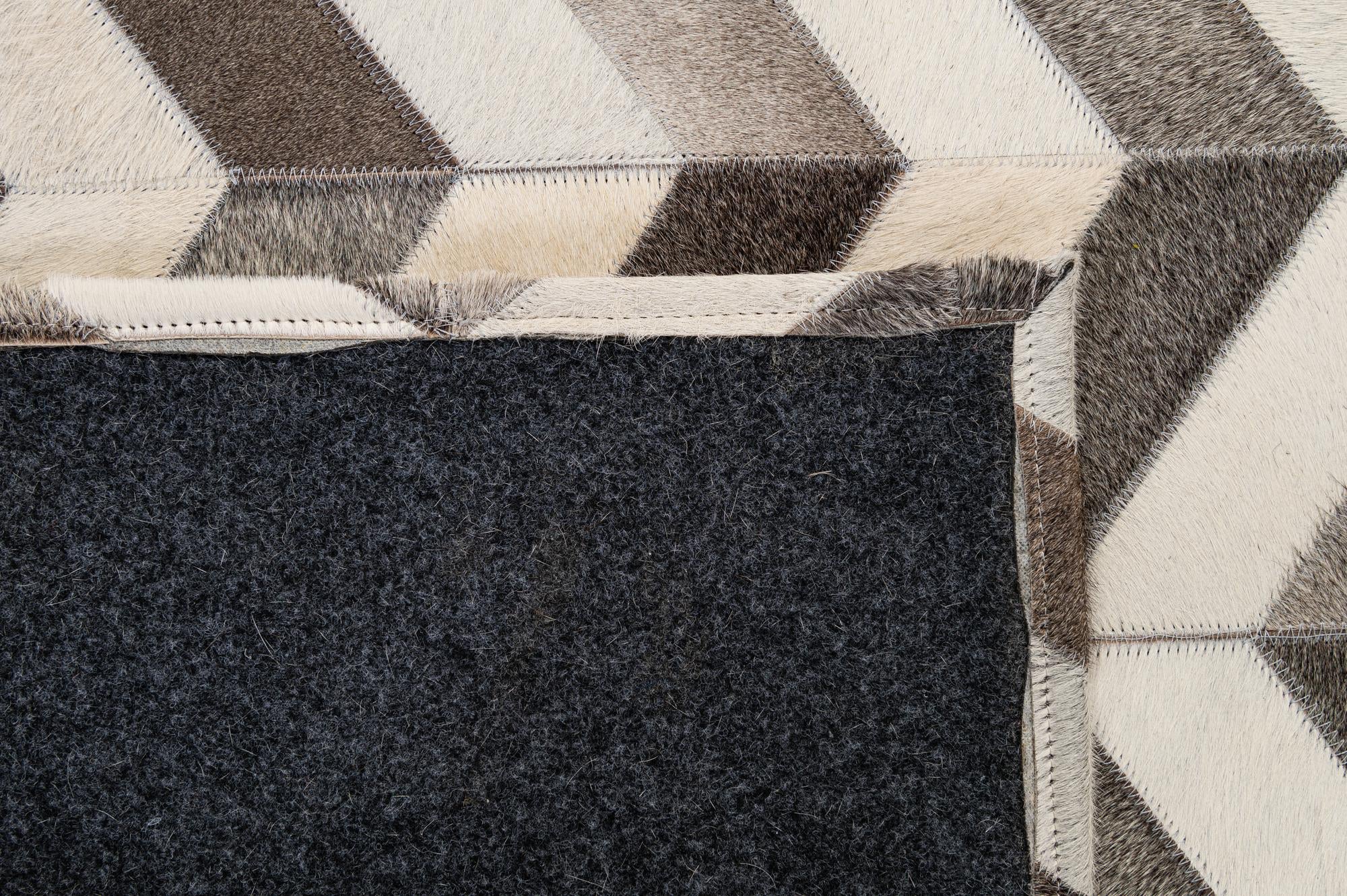 4' 2 x 6' 1 Cowhide - Patchwork Rug
