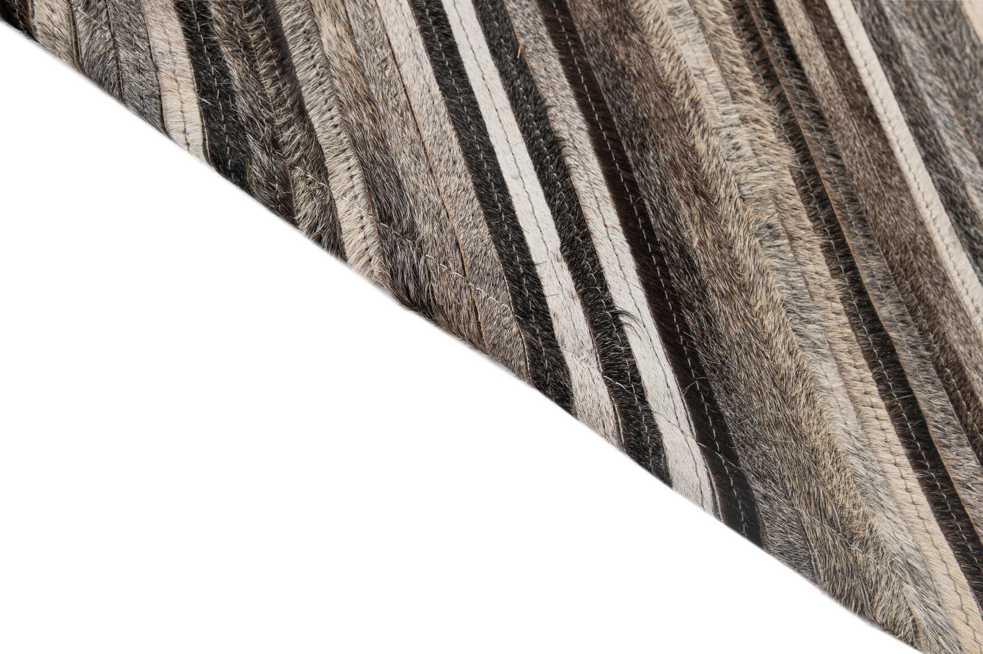 3' 11 x 6' 1 Cowhide - Patchwork Rug