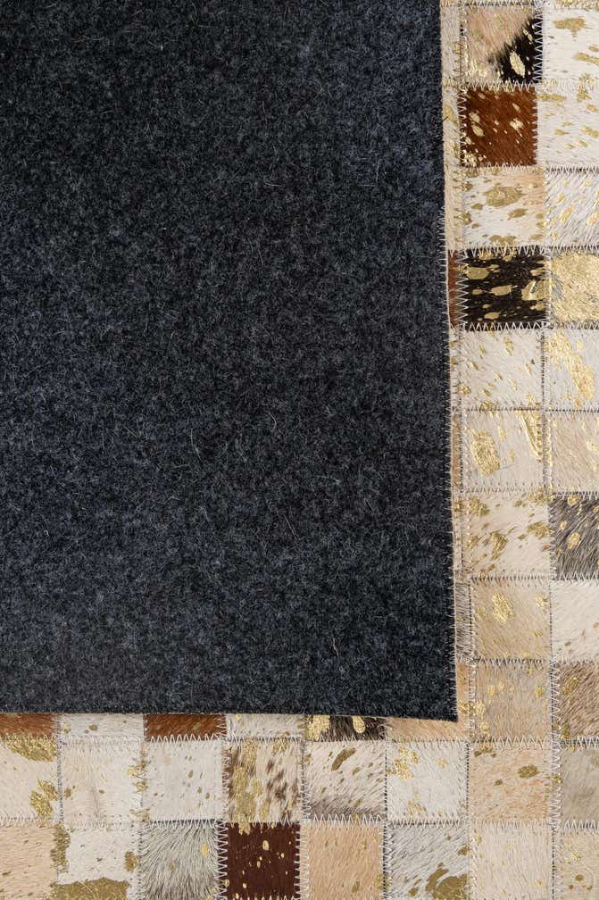 4' 1 x 6' 1 Cowhide - Patchwork Rug