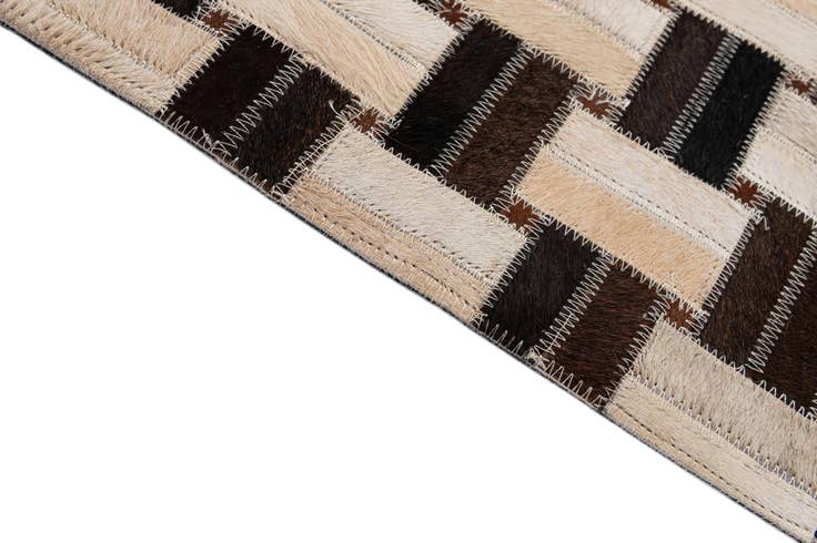 Detail image of 3' 1 x 4' 11 Cowhide - Patchwork Rug