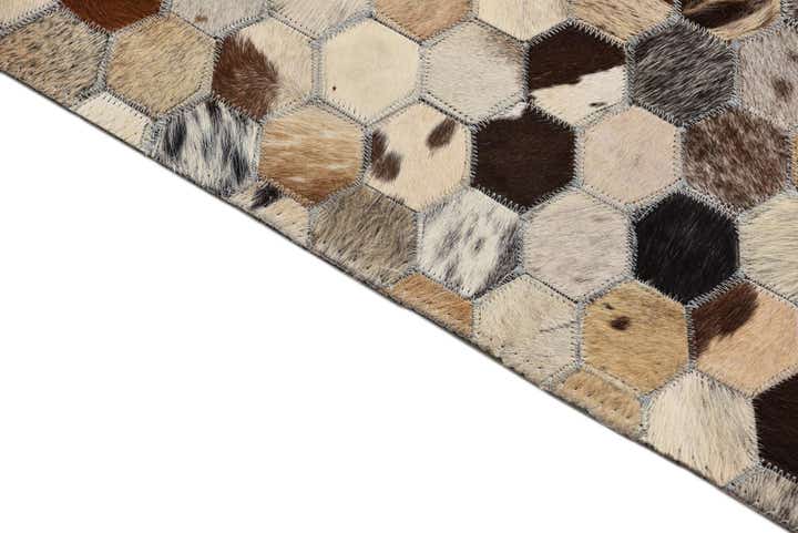 5' 2 x 8' 1 Cowhide Leather Rug