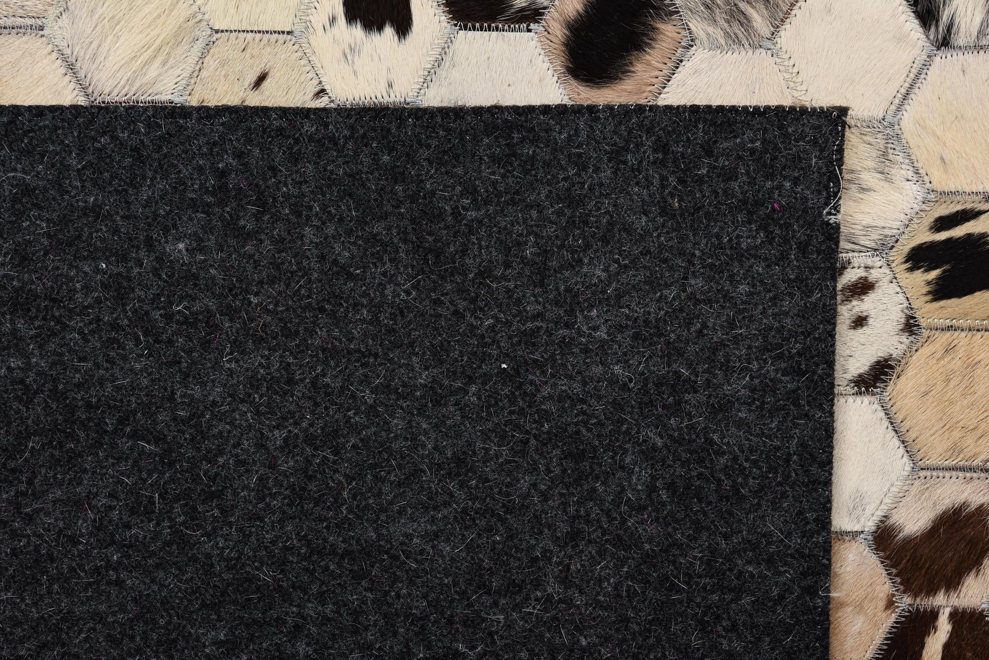 5' 2 x 8' 1 Cowhide Leather Rug