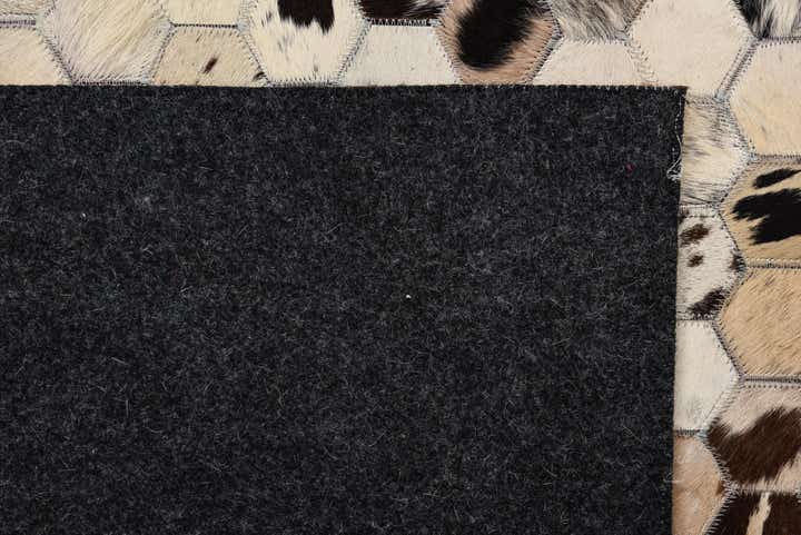 5' 2 x 8' 1 Cowhide Leather Rug