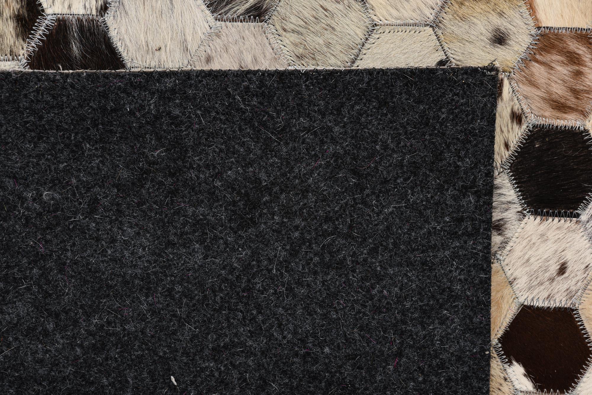 5' 1 x 7' 10 Cowhide Leather Rug