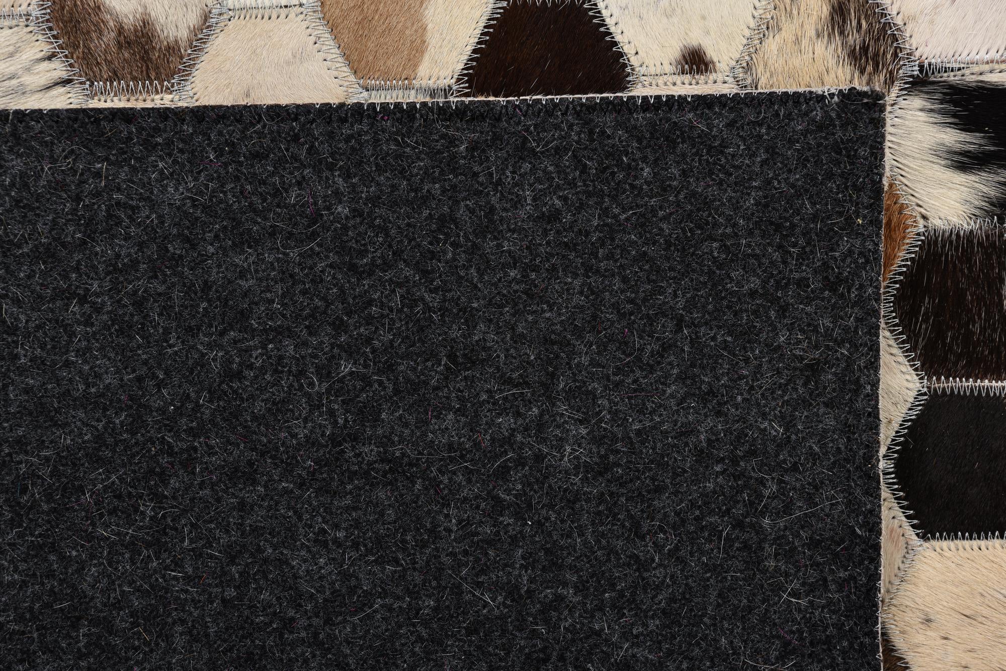 5' 1 x 7' 10 Cowhide Leather Rug