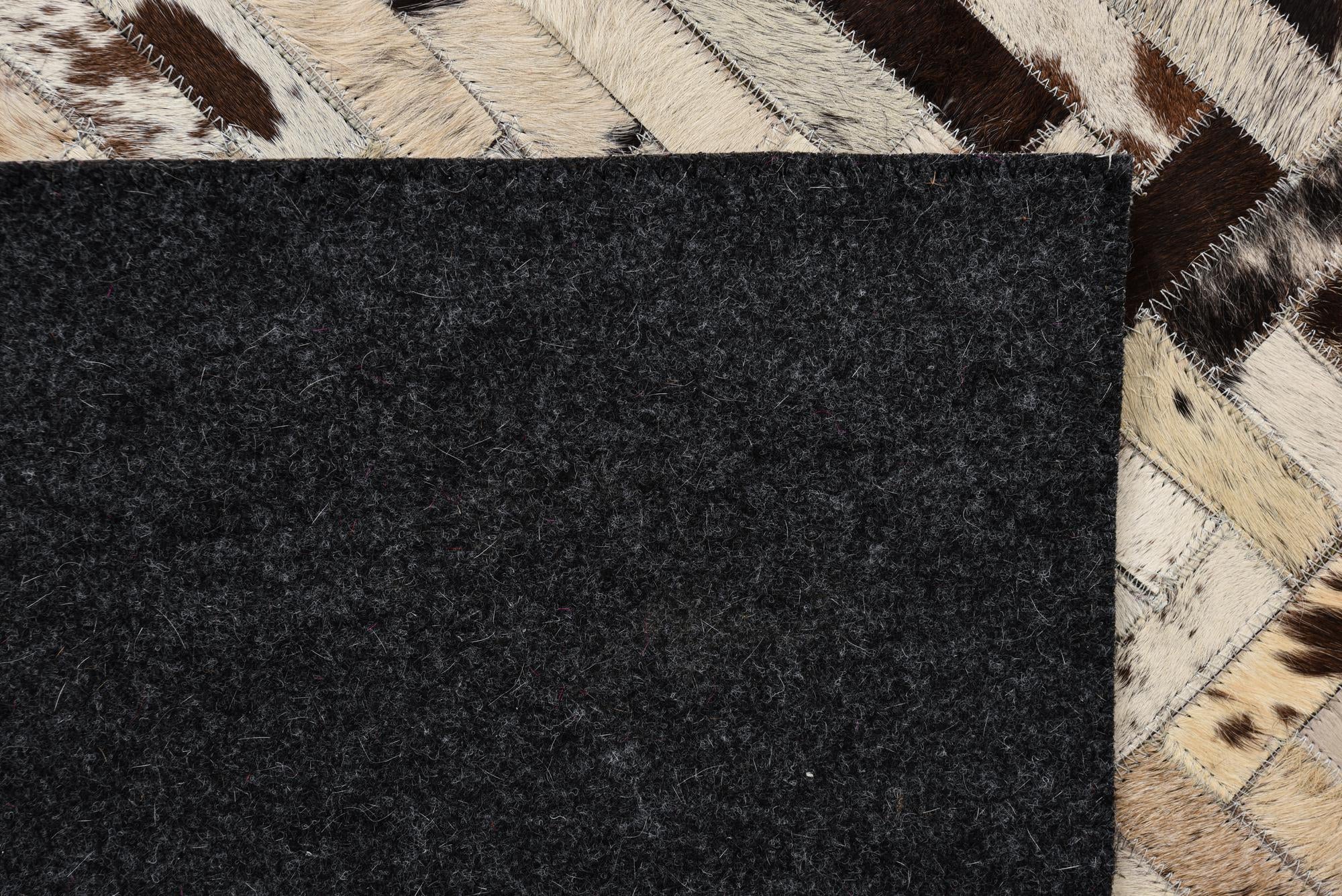 5' 1 x 7' 7 Cowhide Leather Rug
