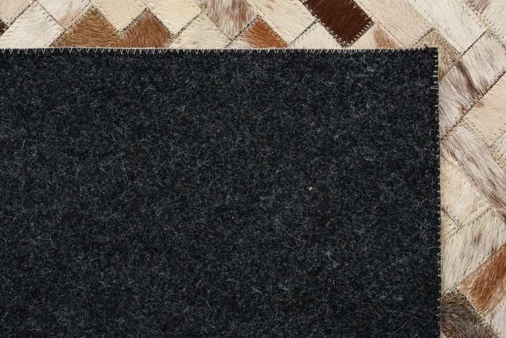 8' 1 x 9' 10 Cowhide Leather Rug