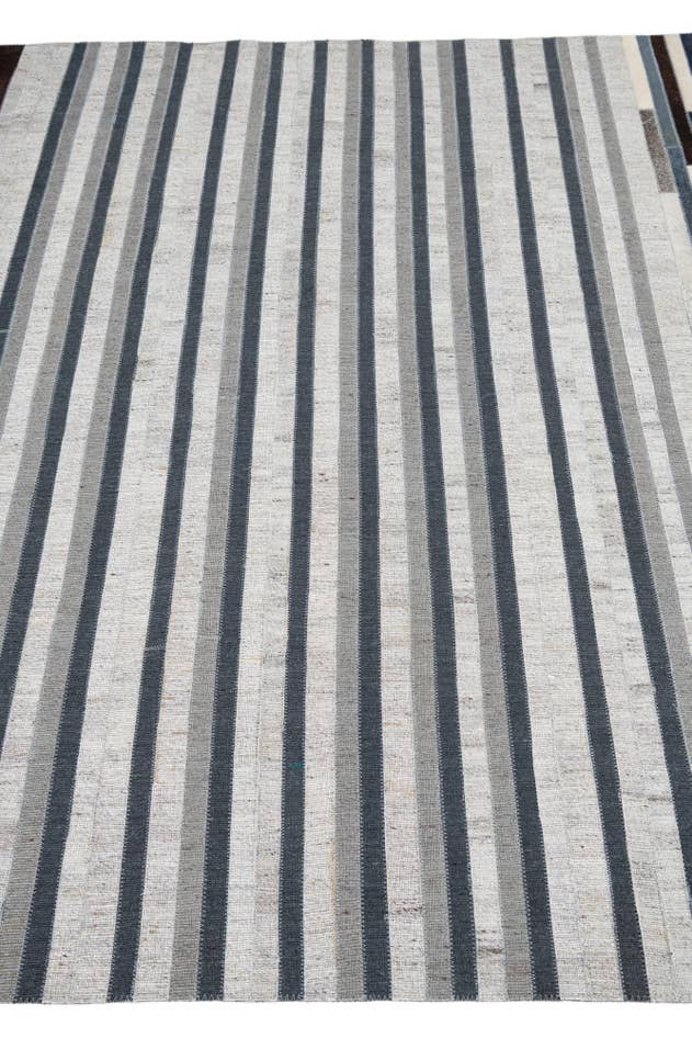 Detail image of 5' 1 x 8' Cowhide Leather Rug