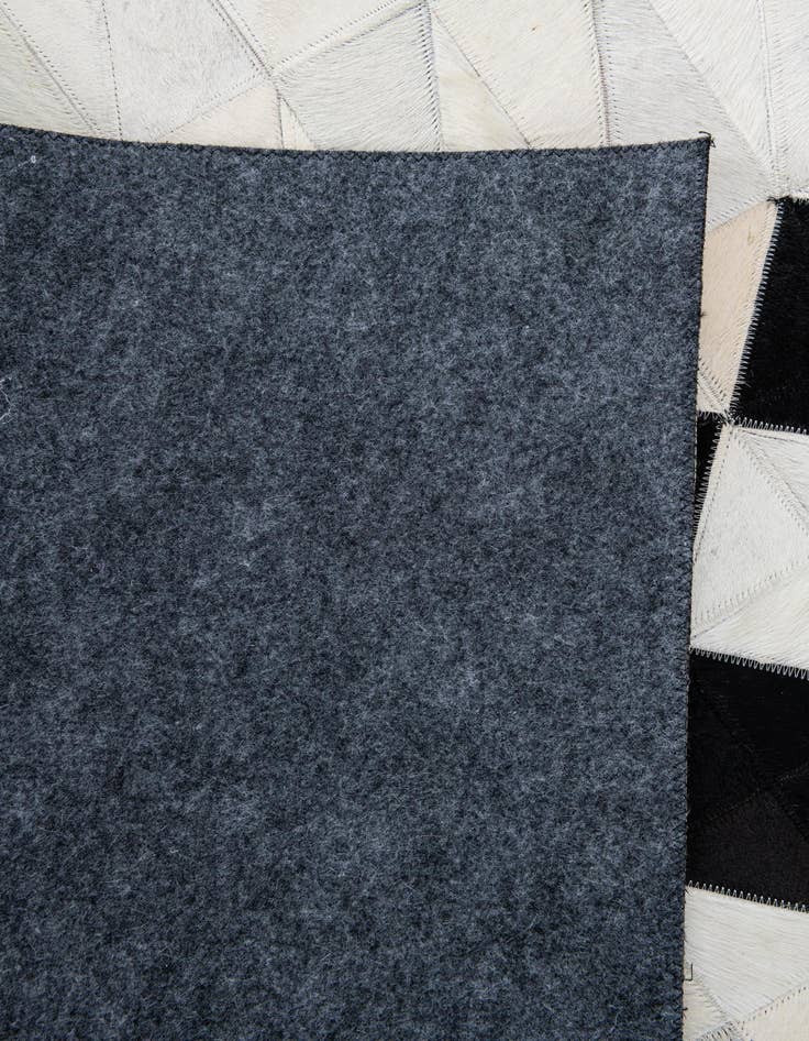 Detail image of 5' x 7' 10 Cowhide Leather Rug