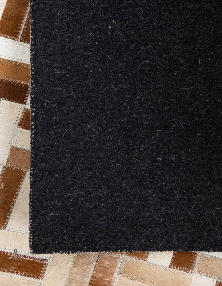 Detail image of 5' 1 x 8' Cowhide Leather Rug