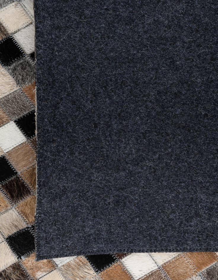 Detail image of 5' 1 x 8' Cowhide Leather Rug