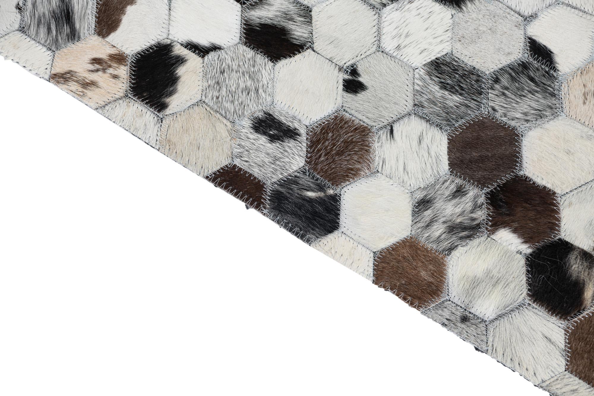 5' 3 x 8' 2 Cowhide Leather Rug