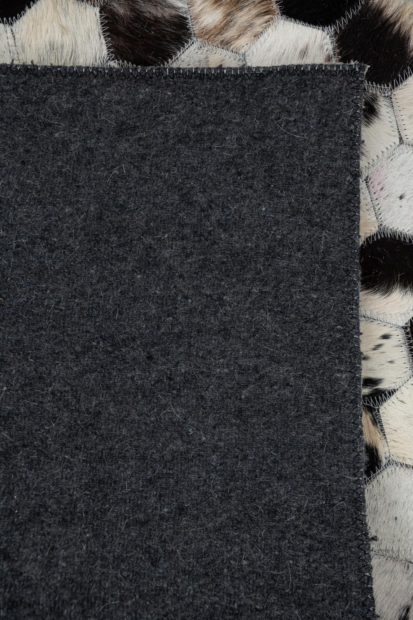 5' 3 x 8' 2 Cowhide Leather Rug