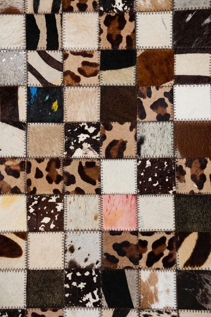 5' 2 x 8' 1 Cowhide Leather Rug