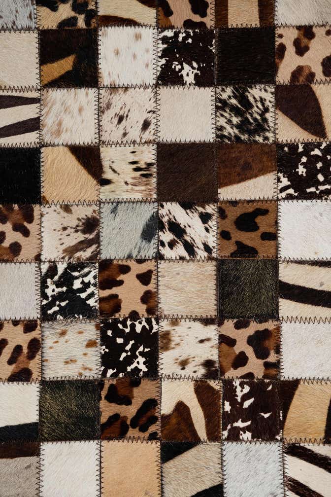 5' 2 x 8' 1 Cowhide Leather Rug