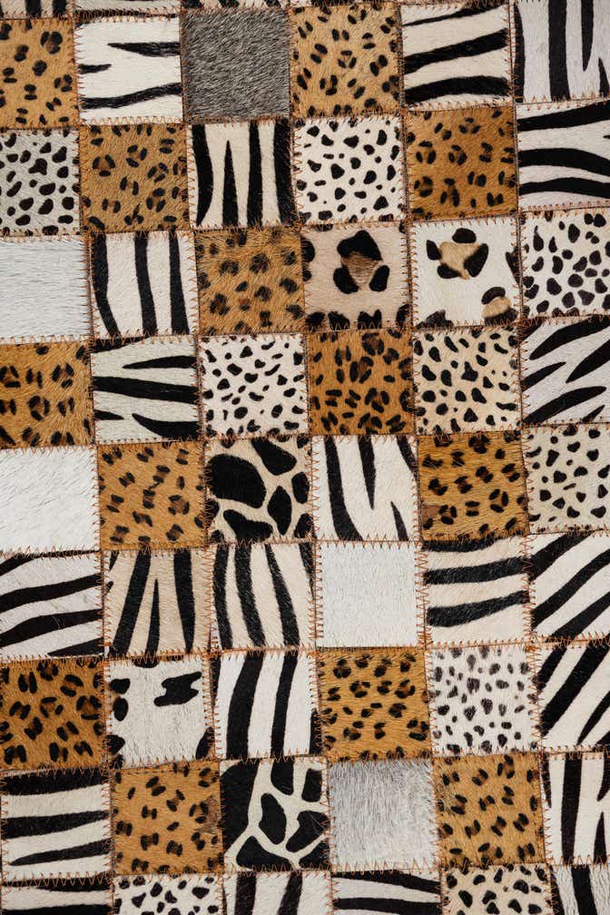 5' 1 x 8' 1 Cowhide Leather Rug