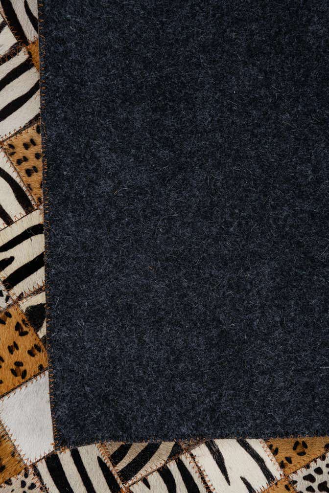 5' 1 x 8' 1 Cowhide Leather Rug