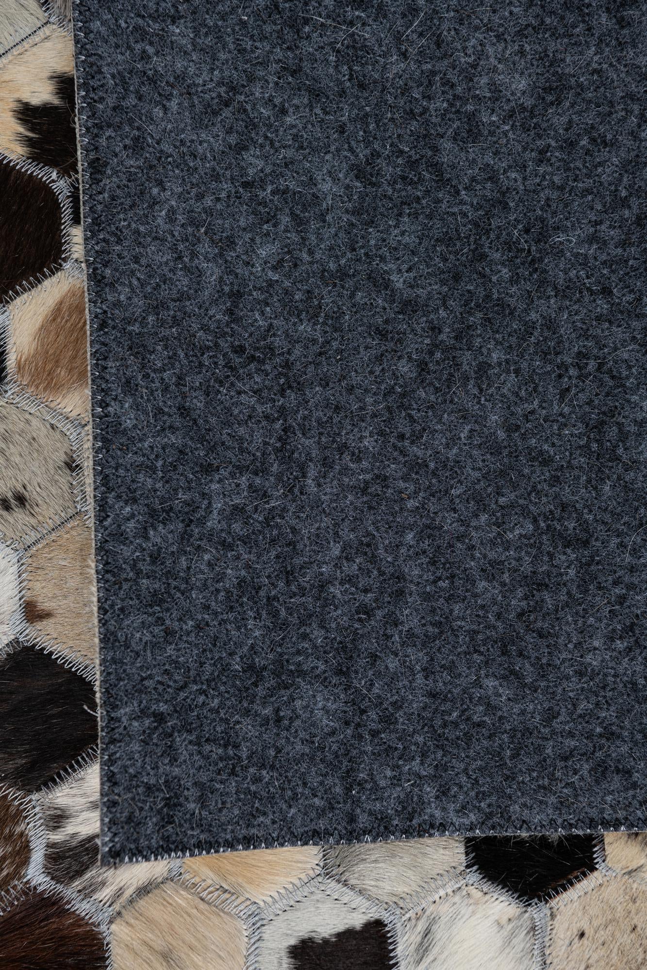 5' 1 x 7' 10 Cowhide Leather Rug
