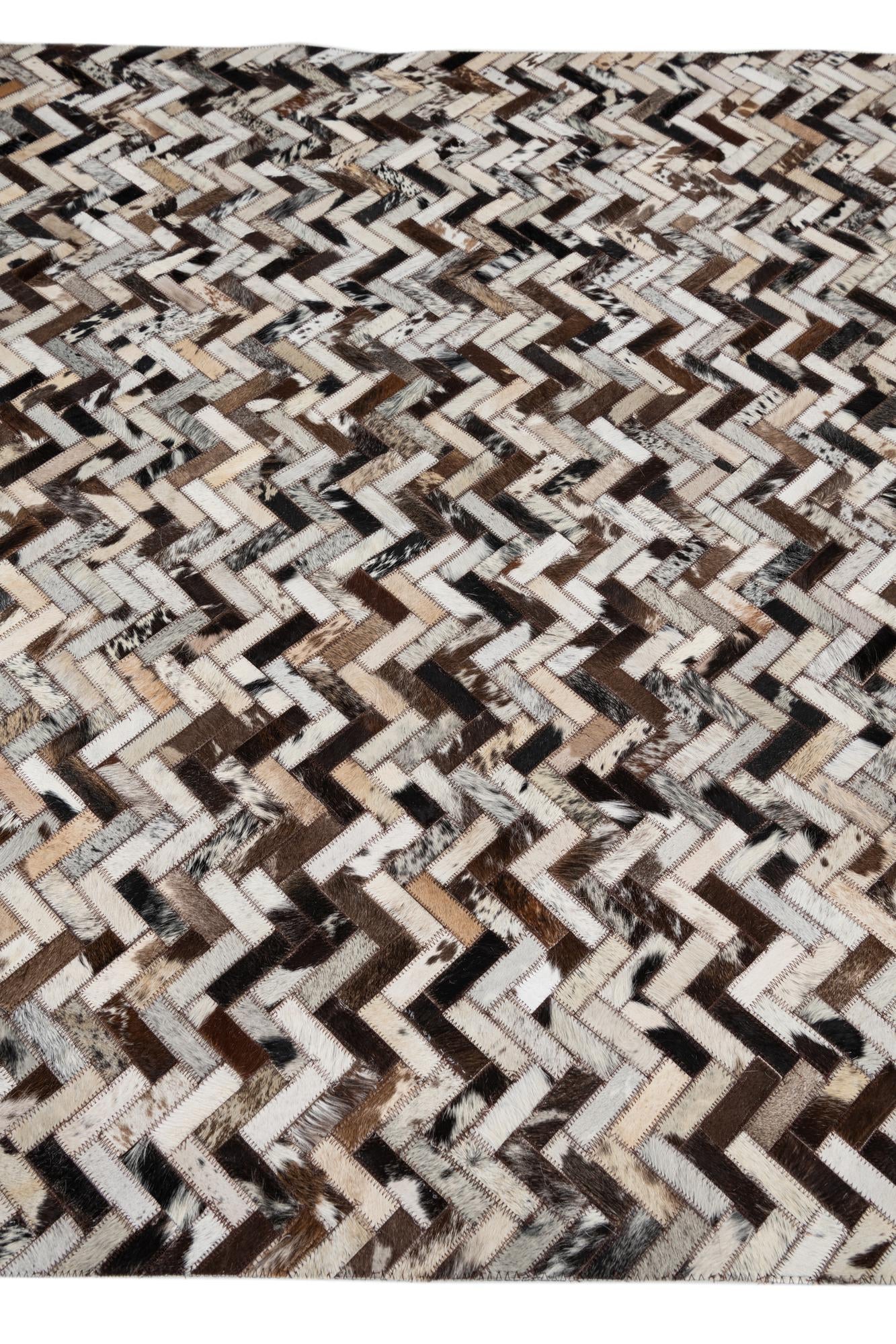 5' 1 x 7' 10 Cowhide Leather Rug