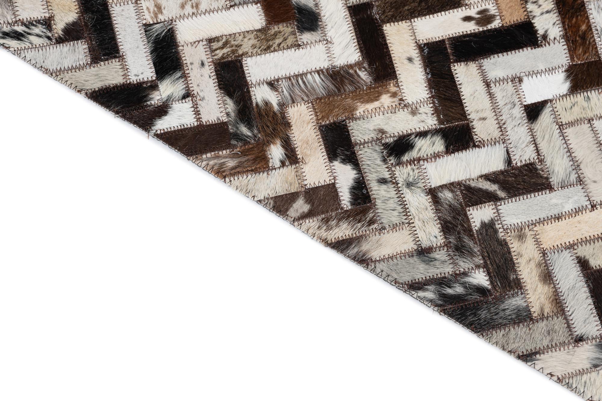 5' 1 x 7' 10 Cowhide Leather Rug