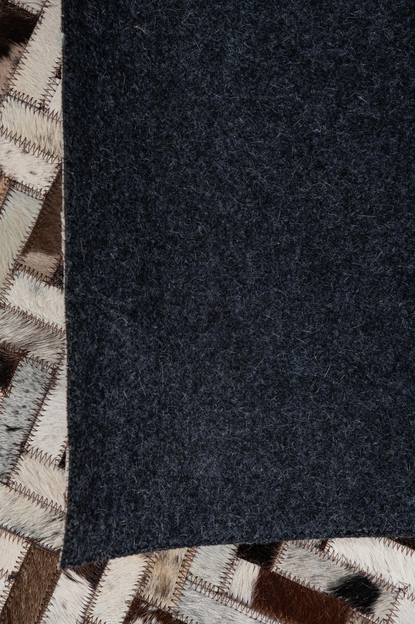 5' 1 x 7' 10 Cowhide Leather Rug