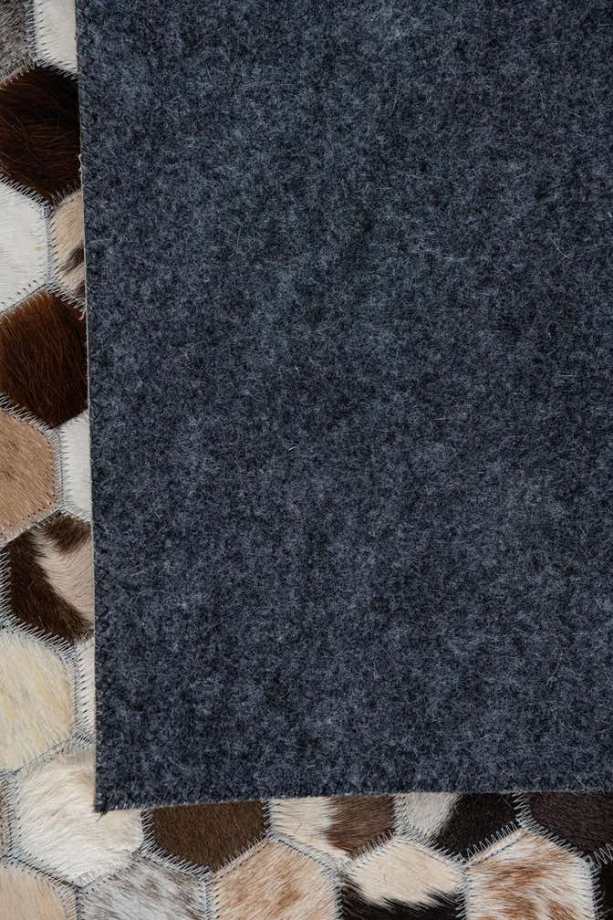 5' 1 x 7' 10 Cowhide Leather Rug